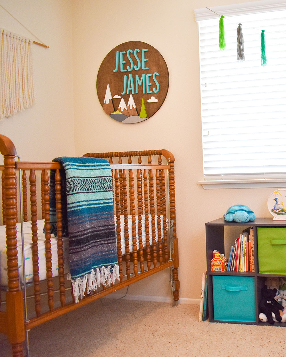 Baby JJ's adventure theme nursery wouldn't be complete with out a Bohemian Fiesta Blanket. It adds a cozy vibe to the room and comes in handy on chilly nights when I'm rocking the baby. Our little guy can take it with him on adventures as he grows older. So cute!