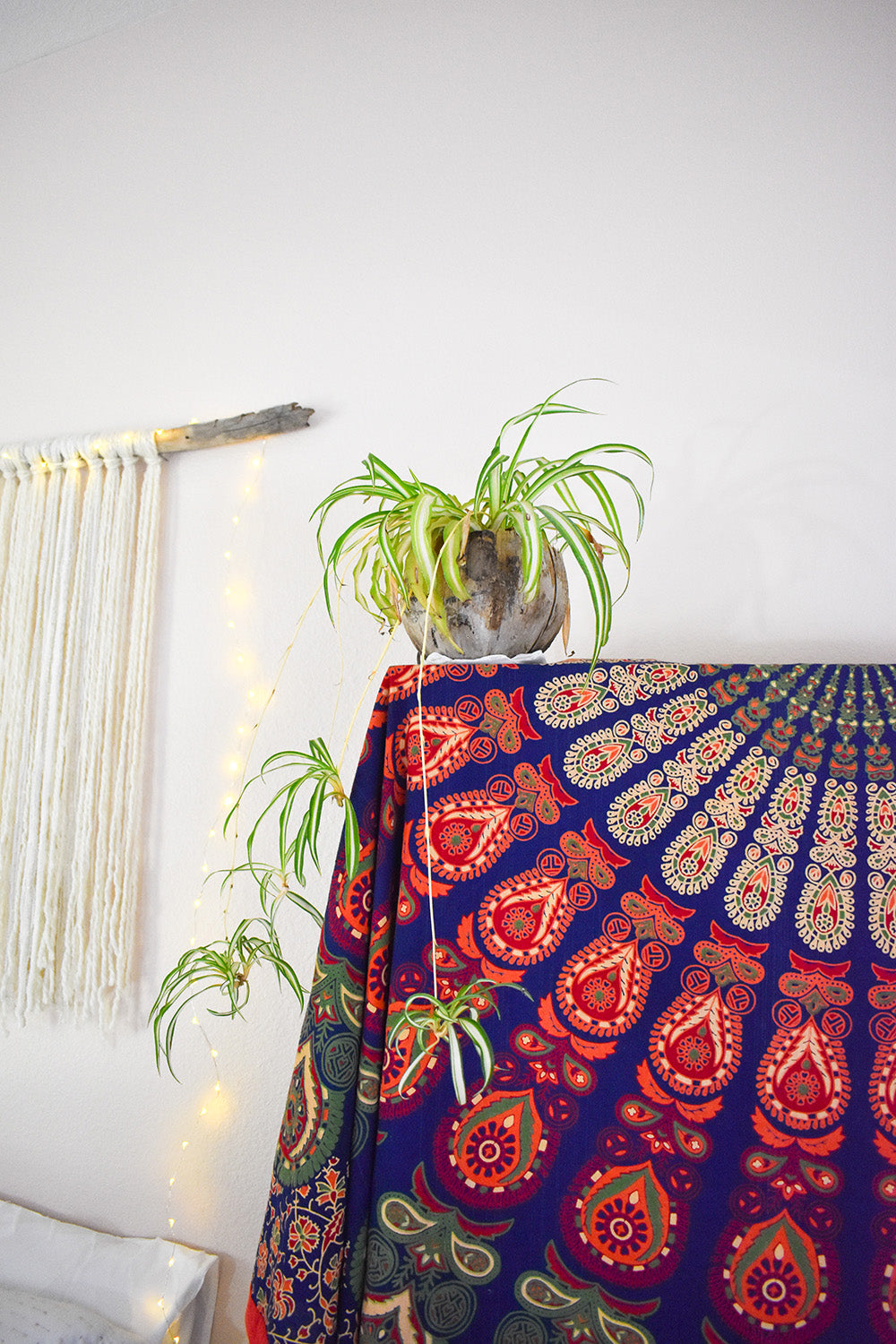 Hippie tapestries update outdated furniture for updated boho home decor. via Davis Taylor Trading Co.
