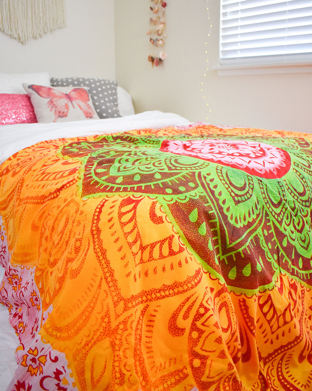 The coolest way to add color and drama to any room is with a tapestry, and the dorm room is no exception. A Boho Roundie can be used in a variety of ways to add color and dimension to your room. Try it on the bed, on the wall, draped over a chair, or even on the floor. 