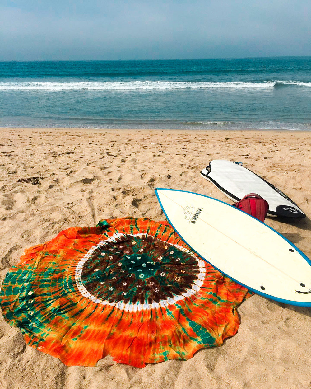 Surfs up with the Earthy Vibes Roundie. A unique beach blanket for the boho soul, hippie girl, or anyone who loves a good pop of color inspired by nature.
