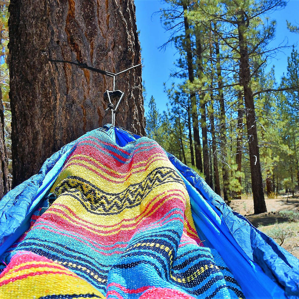 Relaxing in the hammock with my Sunshine Day Dream Mexican Blanket. The perfect boho blanket for all of life's adventures. 