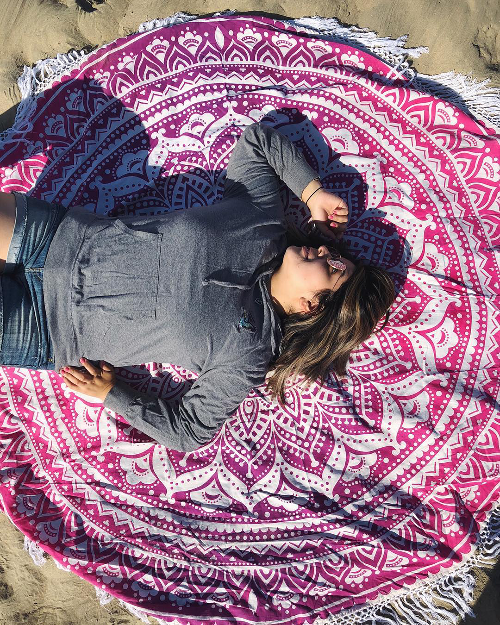 Relaxing on the beach is so much better with the Pretty in Pink Boho Roundie. A colorful round Indian Tapestry perfect for those Instagram worthy shots.