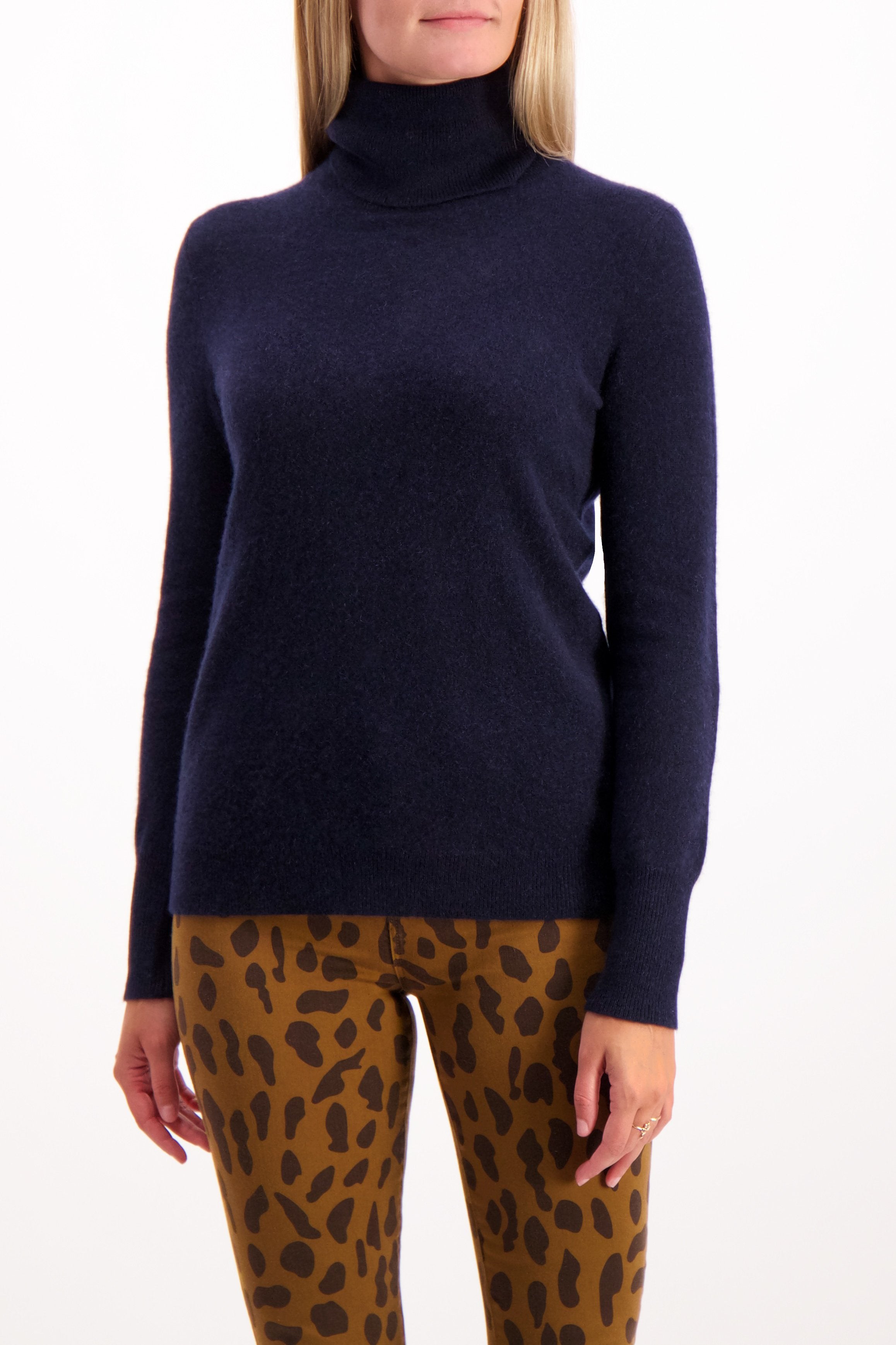 Front Crop image Of Model Wearing white & Warren Essential Turtleneck Sweater Deep Navy