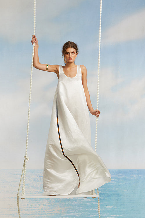 Cynthia Rowley Spring 2018 Look 16 featuring a sleeveless white silk wool maxi dress with grosgrain ribbon