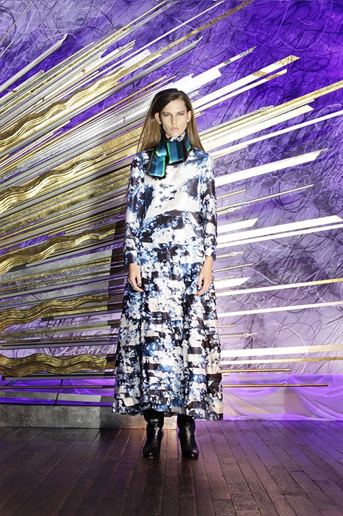 Cynthia Rowley Fall 2014 look 16 featuring a white grey black and blue long sleeve silk printed blouse with high neck with a matching print maxi skirt and black green and blue stripe silk scarf