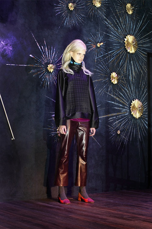 Cynthia Rowley Fall 2014 look 19 featuring a deep purple long sleeve quilted blouse with a quilted front and cooper straight leg leather pants