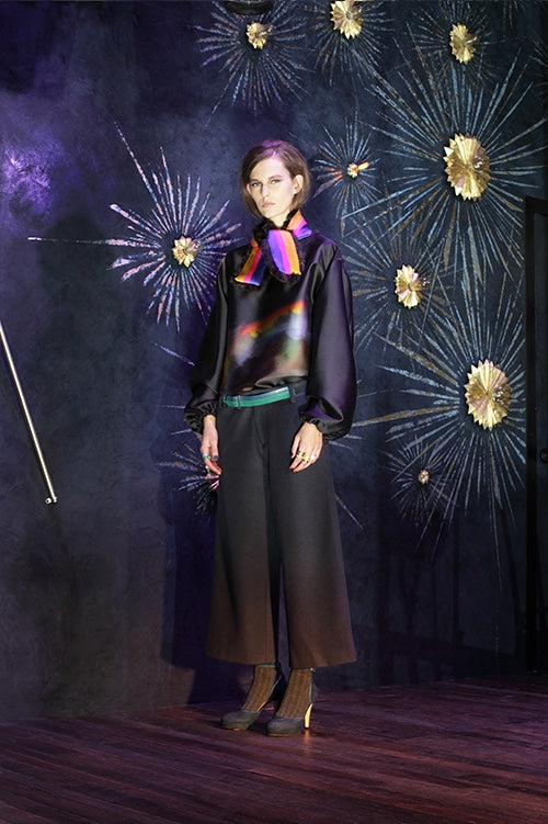 Cynthia Rowley Fall 2014 look 20 featuring a silk blouse with rainbow printed front and bishop sleeves with wide legged black and brown ombre pants and a purple pink and yellow silk scarf