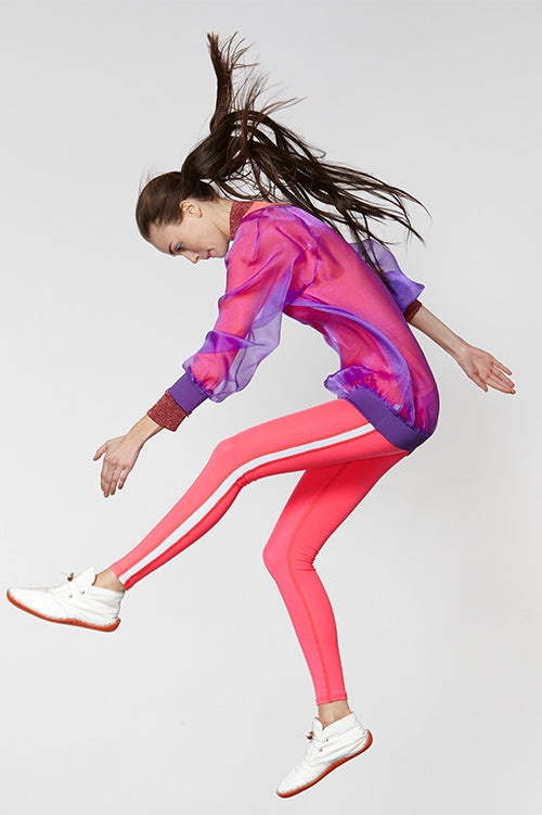 Cynthia Rowley Fall Fitness 2015 look 12 featuring pink leggings with white stripe and sheer purple sweatshirt worn over pink long sleeve shirt