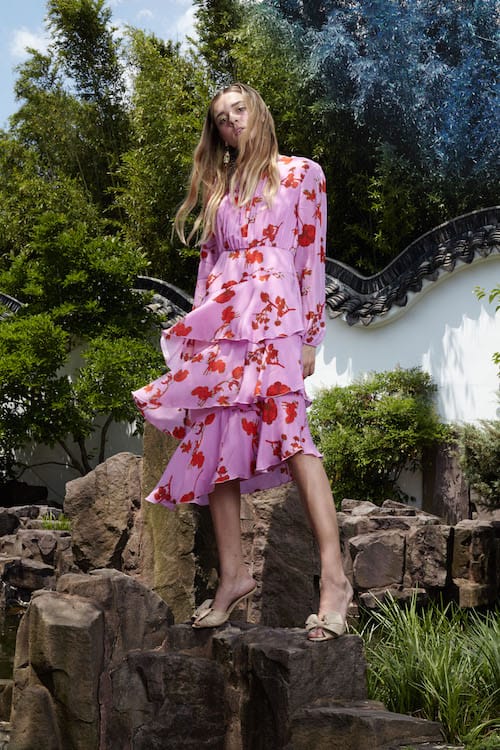 Cynthia Rowley Resort 2018 Look 17 featuring a pink poppy print asymmetrical hem long sleeve dress