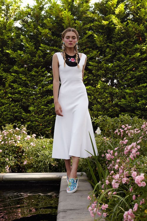 Cynthia Rowley Resort 2018 Look 21 featuring a white jersey sleeveless dress worn over a high neck bikini top wit floral embroidery