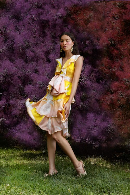 Cynthia Rowley Resort 2018 Look 7 featuring a pineapple printed silk dress with bow and tiered skirt