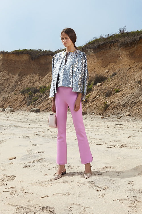Cynthia Rowley Spring 2016 look 30 featuring pink bonded nylon cropped flare pants and silver sequin henley and cardigan