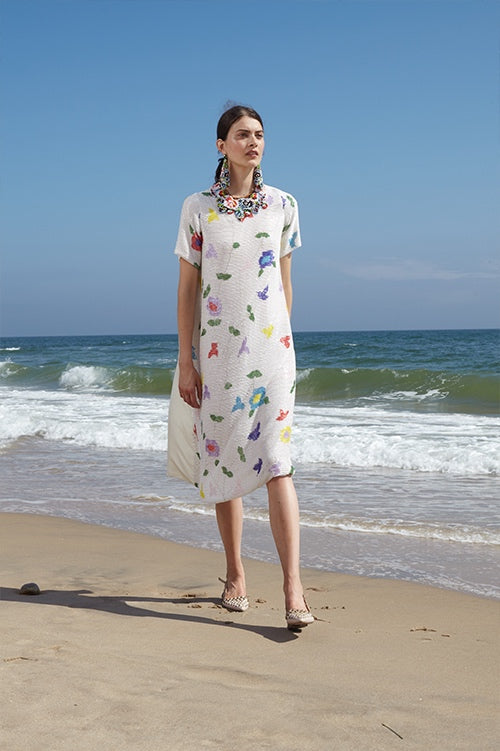 Cynthia Rowley Spring 2016 look 3 featuring a beaded floral knee length short sleeve dress