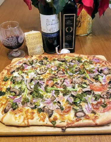 homemade garlic olive oil pizza with fresh veggies 