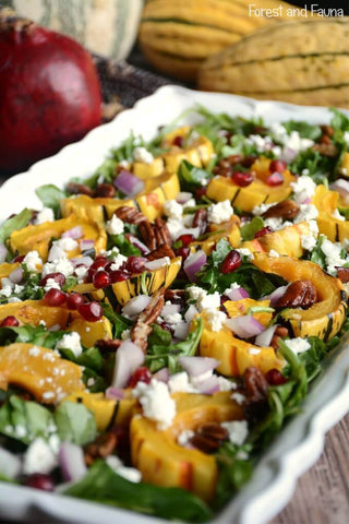 delicata salad with pomegranate and arugula