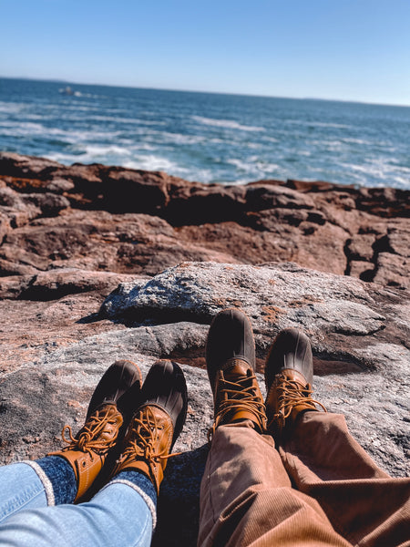 Bean boots next to the ocean in Maine