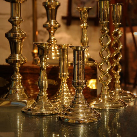 Collection of Antique Brass Candlesticks at LEO Design 
