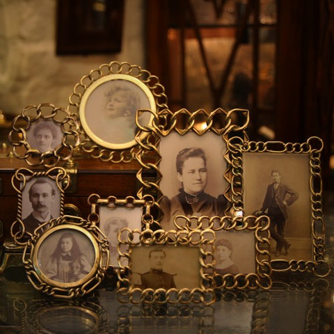 A Collection of Victorian and Edwardian English Brass Chain Photo Frames (LEO Design)
