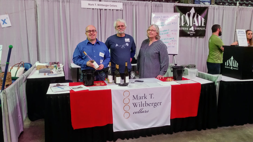 Mark T. Wiltberger Cellars Denise and Jim Toomey helping me at the Wine on Ice Festival in Elmira, NY in January