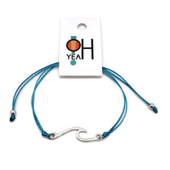 Blue Wave Bracelet by O Yeah Gifts! Wave charm bracelet with blue string.