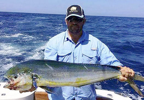 Karl with a Dolphin Fish taken on head start rigs