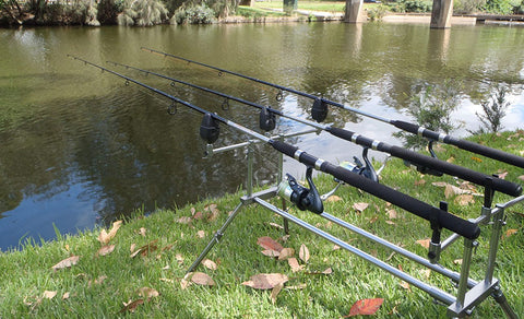 Three 802 light combos set up on rod pod from the shore