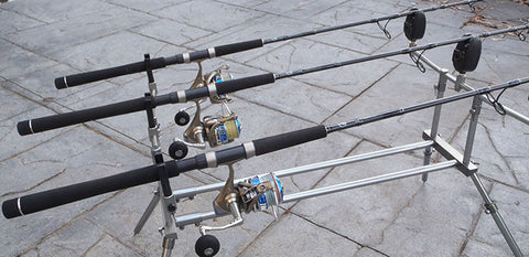 Three rods resting in their rod holder positions