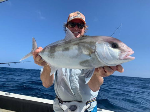 Greg with a Trevally caught jigging