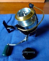 Undo the drag on fishing reel by completely winding off the drag knob