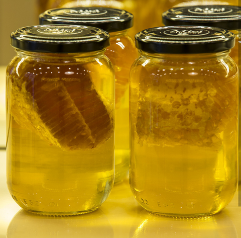 miel d'acacia en rayon dans un bocal - Miel Factory