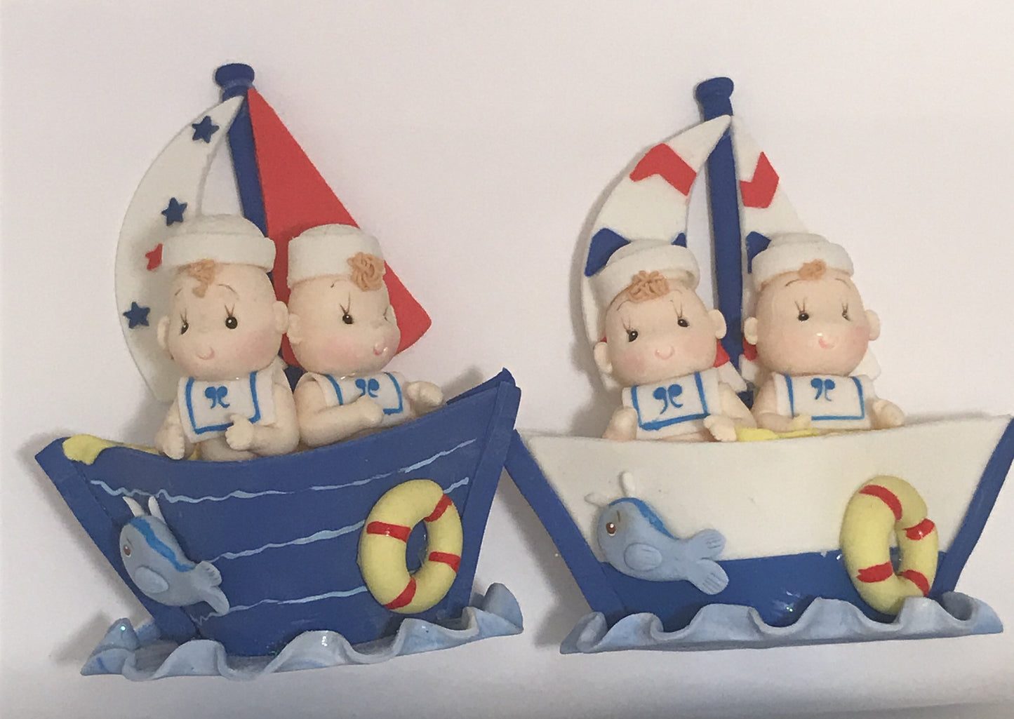 Baby twins in Boat.