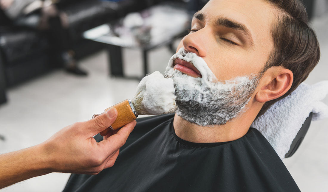 beautician shaving stubble