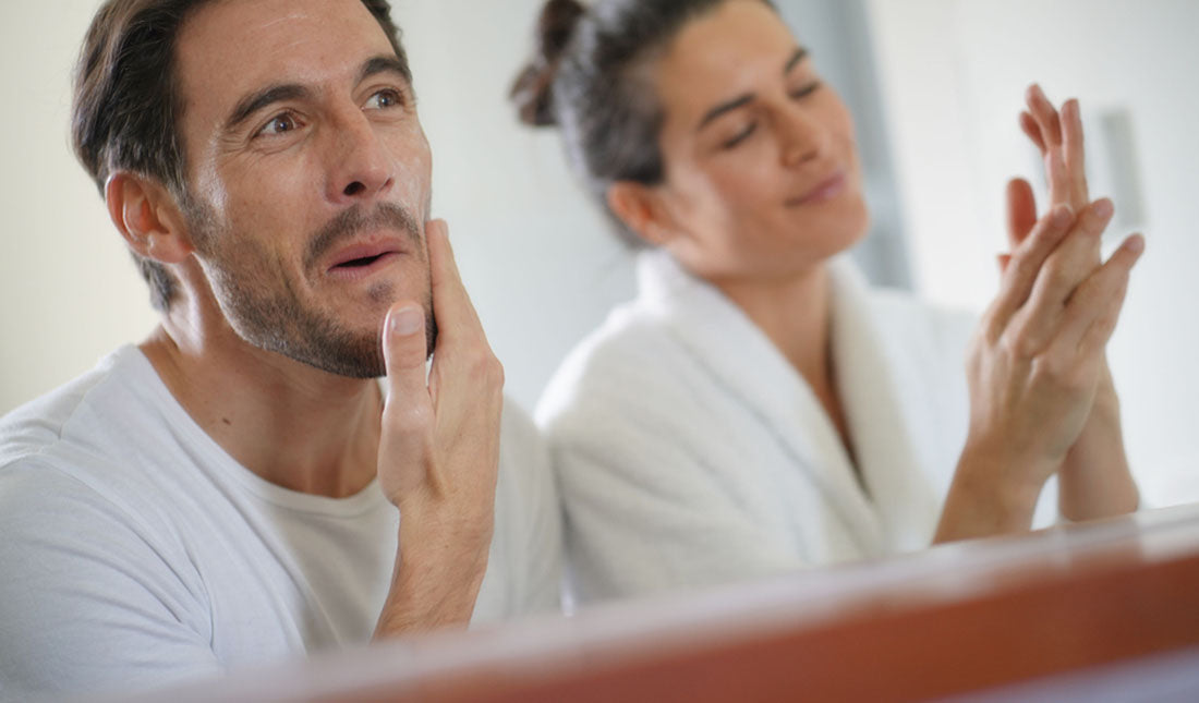 couple performing beauty regimen