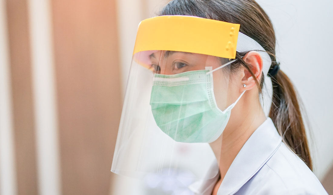medical professional wearing face shield