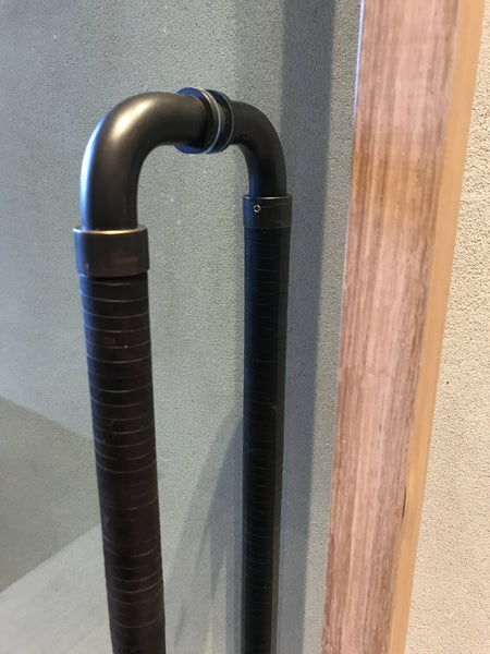 Spiral wrap leather entrance handle
