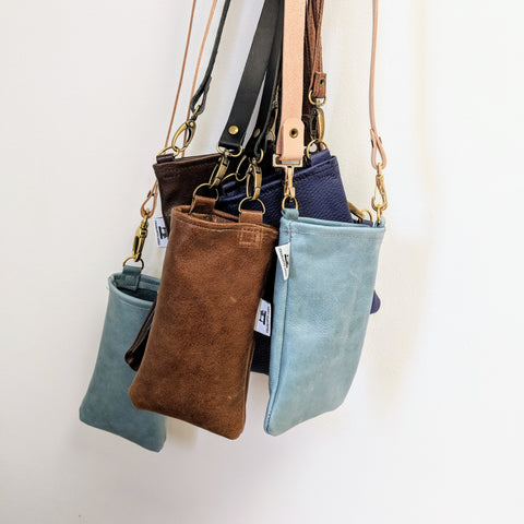 group of leather phone pouches