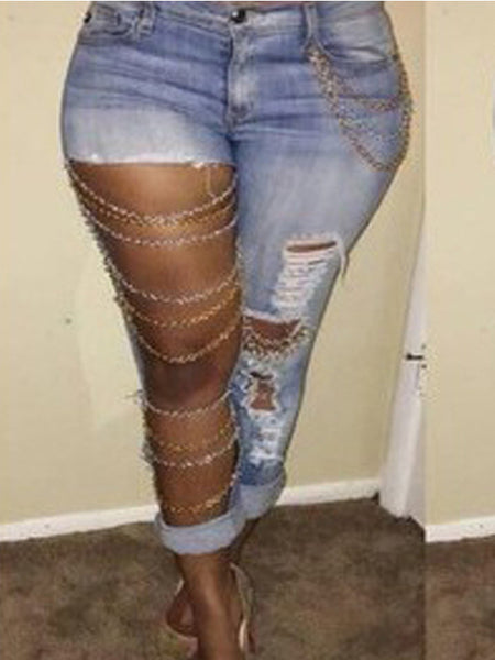 jeans with big holes in them