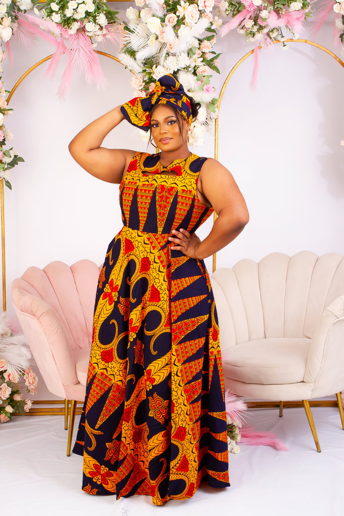 Vibrant Yellow and Navy Blue African Print flare maxi dress perfect for a special occasion. Sleeveless with bust cut out for an edgy and chic look. Shop Ghana African print dress | African maxi dresses | African print gown | African Clothing Online  Shop | Maxi African dress |  African women's clothing  | kitenge dresses | Africa Dresses for Women | African dresses for wedding | Danshiki Dress | Trendy African Dress | African clothing UK