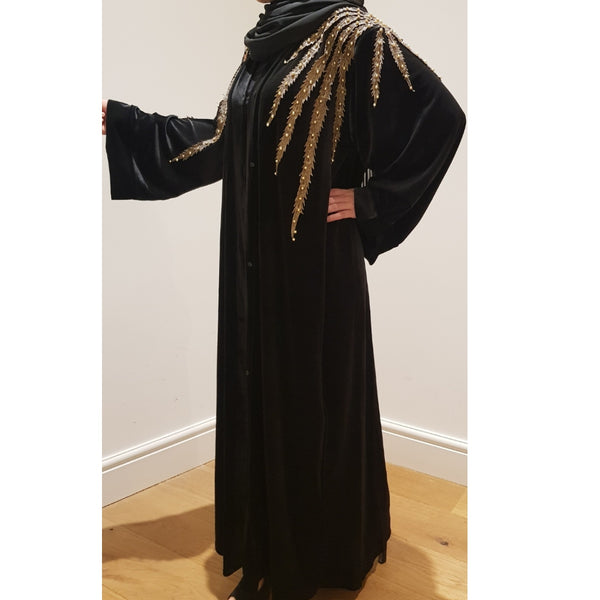 black and gold abaya