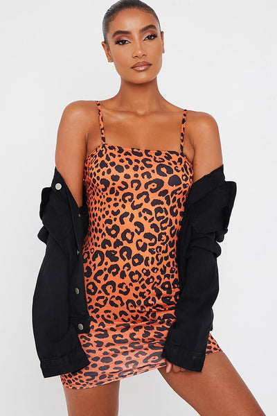 orange and black animal print dress