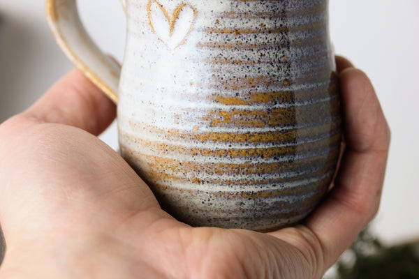 Handmade Mug In Palm of Hand