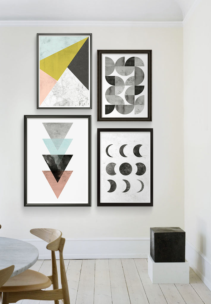 scandinavian interior with abstract art prints, moonphase print and watercolor poster