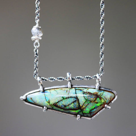 silver pendant necklace with opal in silver setting