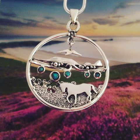 Worm's Headlandscape necklace with horse