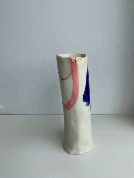 tall vase with pink and blue lines