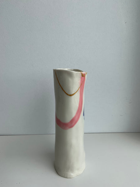 fixed vase with a pink and gold line
