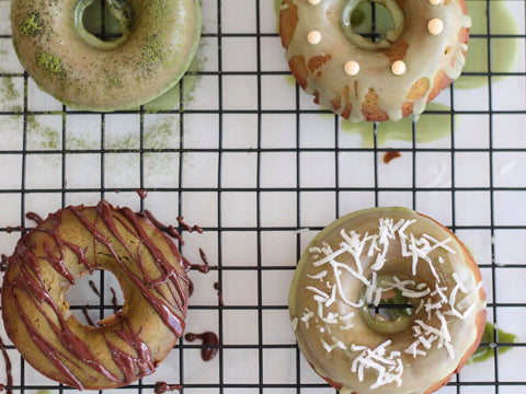 Photo of matcha green tea cake donuts with various toppings