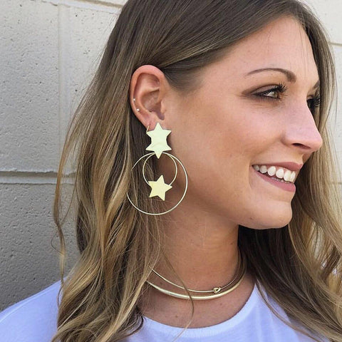 Model Wearing Sheila Fajl Cassiopeia Front Hoops Earrings with Stars in Gold