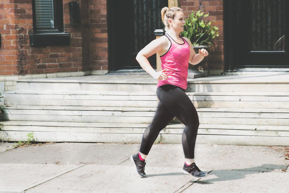 woman jogging with socks in sock of the month club