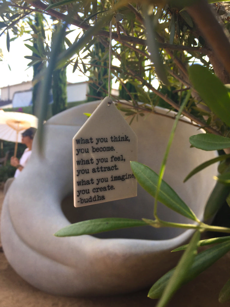 buddha quote at outdoor purple garden at Underground Museum LA